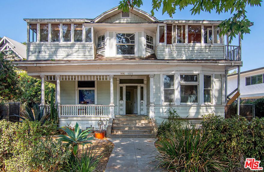 FIXER Alert!  1906 Craftsman on a sprawling 9,050 sq ft lot zoned LARD1.5 in the center of Highland Park.  Located within the Highland Park HPOZ the dwelling consists of 3 units (buyer to verify).  Property will be delivered VACANT at the close of escrow.  With a welcoming front porch and original details intact you can feel the history and grandeur of what this property once was.  She is waiting to be restored to her original splendor!  Interior center hallway leads to the 3 units, each with a separate entrance.  Two are on the lower level and one is on the second level.  Each unit has an abundance of windows allowing for natural light and incredibly high 10' ft ceilings. Each has its own kitchen and one bathroom.  Spacious units with many options to rework floor plans.  On record property is 4 bedrooms, 3 bathrooms in 2179 sq feet.  Detached 2-car garage on property is full of debris and may be structurally unsafe.  Property is in need of renovations and is being sold AS-IS.  Seller has not lived at the property since 2005.   Walkable to shops, restaurants and markets and only minutes to transportation and freeways.  Bring your creative vision and dive into the historic possibilities for the chance to restore this cherished piece of LA history.  Cash offers only.  DO NOT WALK ON PROPERTY.  By Appt or Open House only.  Also listed as income MLS #25-603961