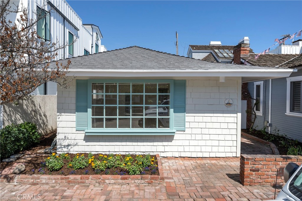 Charming front unit YEARLY LEASE in the 100 block of Apolena Ave, on quaint Balboa Island. Its ideal location, sometimes called "Story Book Row", is one of the most sought after locations on Balboa Island. This tight knit community of homeowners take pride in their properties and it shows! The home is just six houses from the South Bayfront and three streets from Marine Avenue shops and restaurants. The enchanting brick side patio creates a lovely, private outdoor space and leads to a soft turquoise Dutch door entrance. The large living and dining area has three picture windows making the home very light and bright. Freshly painted inside and out with new plank wood flooring and a remodeled kitchen with newer appliances, this home is single level with two bedrooms and a full bath. One bedroom also has an adjoining room that is perfect for an office, a nursery, or even a converted third bedroom with closet. Laundry is located in the rear entrance garage. Enjoy the finest SoCal lifestyle by experiencing the coastal elegance of charming Balboa Island. Aside of the island's many shops and restaurants, this home's convenient location is just a short drive to Fashion Island, Corona Del Mar, and Newport Beach's glorious beaches and restaurants.