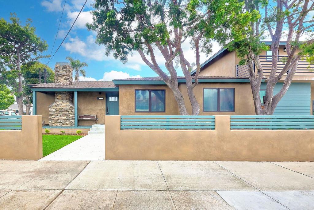 STUNNING 2023 COMPLETE REMODEL - MOVE-IN READY! This gorgeous 3-bedroom, 2-bathroom modern home offers 1,356 square feet of beautifully redesigned living space in prime Oceanside location. The open-concept floor plan features soaring ceilings, elegant light wood flooring throughout, and abundant natural light from oversized windows. The chef's kitchen boasts a large center island, premium stainless steel appliances, marble countertops, and seamless flow to the living area with a striking geometric tile fireplace. Both bathrooms showcase designer touches with eye-catching blue geometric tile work and modern vanities. Additional highlights include a private outdoor deck, in-unit laundry, built-in storage solutions, central air/heat, and ceiling fans throughout. Everything has been completely renovated with high-end finishes and is move-in ready! Walking distance to beaches, restaurants, and Coast Highway. This exceptional rental opportunity won't last long in today's market. Available immediately. Dogs and Cats allowed. Note: Info deemed reliable but not guaranteed.