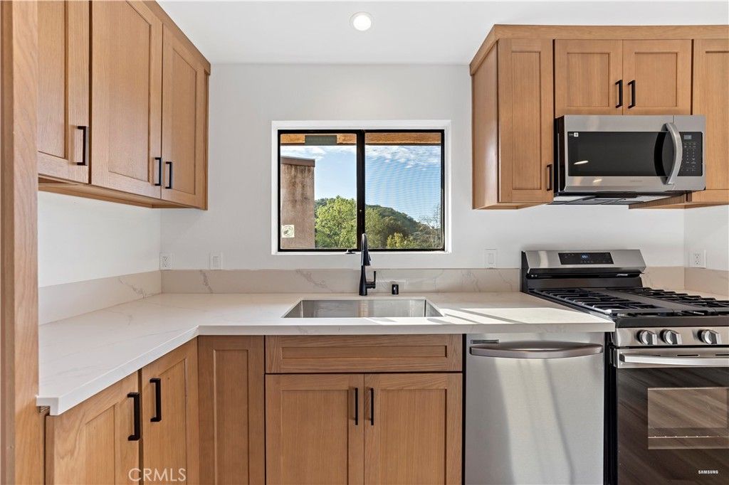 Photo of 5036 Echo Street #408, Los Angeles, CA 90042 (MLS # OC26033692)