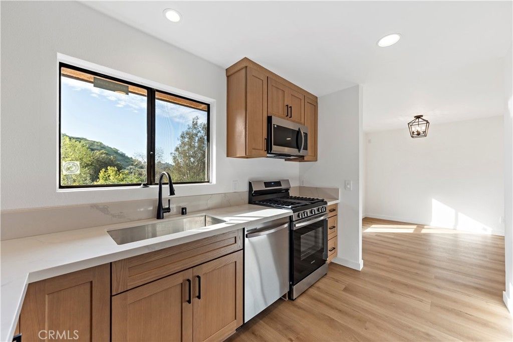 Photo of 5036 Echo Street #408, Los Angeles, CA 90042 (MLS # OC26033692)