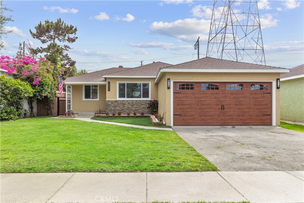 Welcome to 6458 Nixon St in the heart of Lakewood Estates! This beautifully remodeled 3-bedroom, 2-bathroom home offers 1,602 sq ft of modern living space. Step inside to find a bright, open-concept layout featuring brand new hardwood flooring, fresh interior paint, and stylish fixtures throughout. The upgraded kitchen boasts quartz countertops, custom cabinetry, and stainless steel appliances—perfect for both everyday living and entertaining.
Both bathrooms have been tastefully renovated with contemporary tile work and sleek vanities. The spacious primary suite includes a private bath and ample closet space. Additional highlights include new windows, recessed lighting, and a dedicated laundry area.
Outside, enjoy a private backyard ideal for relaxing or entertaining, along with a freshly landscaped front yard that enhances curb appeal. Conveniently located near parks, schools, shopping, and freeways—this turnkey home is ready for you to move in and make it your own!