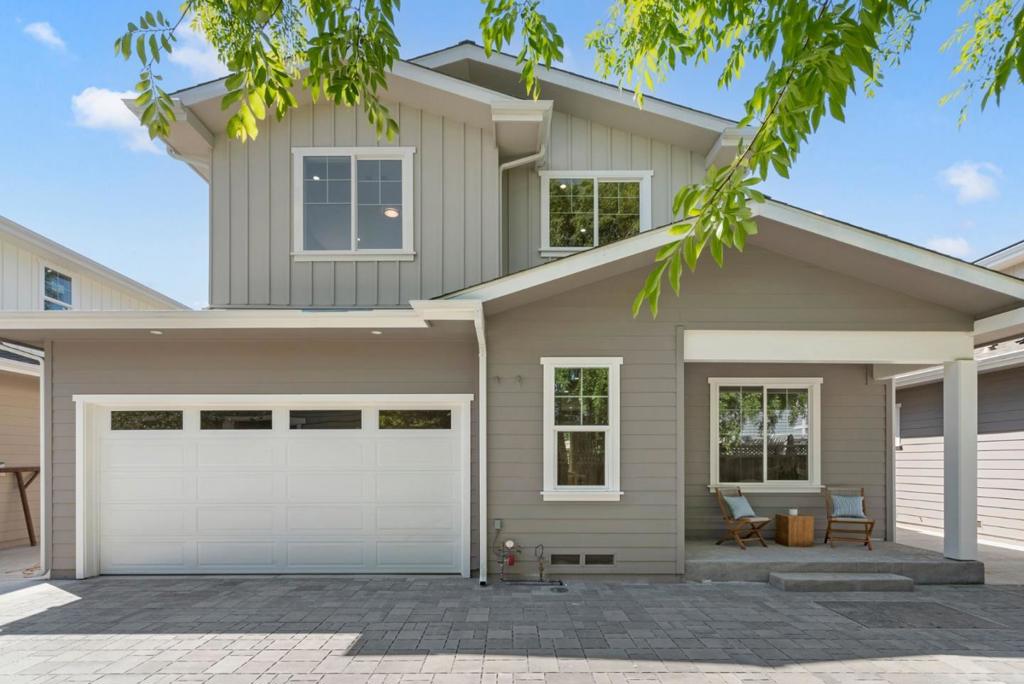 Don't miss this stunning, newly completed home in the quaint San Tomas Area of Campbell. Top quality craftsmanship and finishes. Open-concept floorplan ideal for modern living. High-end amenities include central A/C, recessed lighting, and solar system. Luxurious design with light hardwood floors, detailed raised-panel cabinetry, textured tiles, and quartz countertops. Spa-inspired bathrooms. Ground floor junior suite for office or guest quarters. Chefs kitchen in cream tones with large island, double sinks, and stainless steel appliances. Contemporary, linear fireplace in living room, with abundance of natural light. Sliding doors to private patio and newly landscaped private back yard. Upstairs reveal 2 guest bedrooms sharing an elegant hallway bath, and a spacious laundry room. Serene primary suite is light and bright. Oversized walk-in closet. High-end ensuite bathroom with dual sinks and industrial glass shower door. Finished attached 2-car garage for flexible use. Easy access to routes 85, 17 & 280. Only 2 miles to Netflix. Close to private schools like Harker and award-winning public schools like Forest Hill Elementary. Call it home today!