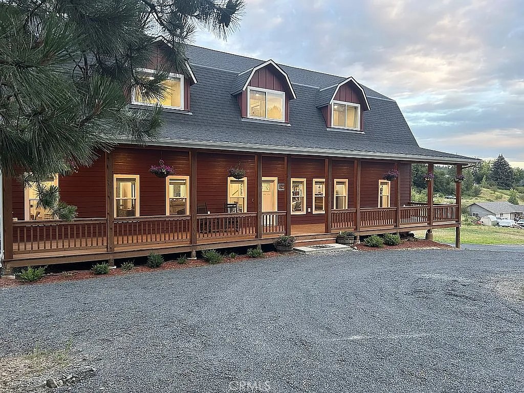 This is a beautiful family home within Troy city limits (city water and city sewer) on two lots (totaling 1.3 acres). This home is close to schools and a quick 12 min drive to shopping, dining, and entertainment in Moscow. The main level of this home conveniently includes the master suite, guest bedroom and bath, and a mother-in-law suite of rooms (including bed, bath, kitchenette, sunroom, laundry) with a separate outside entrance and deck access. It also has a great room, library, kitchen (with Jenn-Air convection double ovens, a warming drawer, in-counter Wolf deep fryer and steamer), a large pantry, dining, and utility room (including laundry, craft area, and a salon hair sink) also grace the main floor. The upper floor houses four large bedrooms (11'x16', 11'x17', 11'x19', and 12'x14'), two baths, laundry facility, and a large open area family room. Below grade features an oversized garage with three bays (optional fourth bay) and an unfinished area designated theater room, kitchenette corner, and bathroom along with a large mechanical room.
Each of the two above grade floors is serviced by its own 5 ton HVAC system and 11 gal/min tankless water heater. Enjoy watching the State Champion Troy High School parades along Big Meadow Road from a 10’ x 64’ front deck and host parties on the 12’ x 44’ back deck with a stubbed access for a natural gas grill.
Raised garden beds and 12x16 insulated shed with power/lighting are behind the home. A small stream runs along the back of the yard and is supplied by run-off and rain water. There is also an RV pad with full hookups off the driveway.
This home was owner driven and over-engineered in almost every way. The roof trusses are rated for a 100 lb/ft² snow load (while only a 60 lb/ft² rating is required for this area), 140 mph winds, seismic category D, and exposure C to meet or exceed 2021 IRC/IBC specs.
Buyer to verify all information.