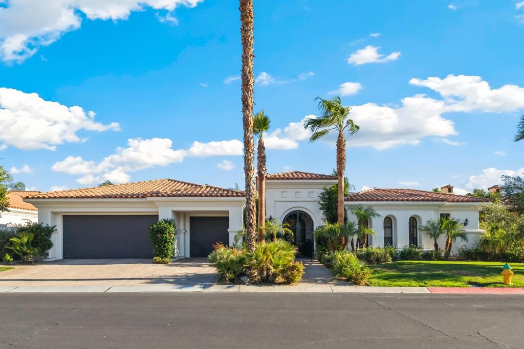 No expense spared in this stunning 4 bed, 5 bath single level home that comes to you Fully Furnished and features a private resort-like swimming pool and spa, panoramic golf course and mountain views, and gorgeous curb appeal. The interior is open and spacious with soaring ceilings, LED lights, beautiful archways, and the entire home is basked in natural light. The formal living room offers a fireplace and glass doors to the backyard. The gourmet chef's kitchen features a wrap around bar, a center island, and opens to the large family room with floor to ceiling windows. There is also a breakfast nook and a formal dining room. All of the bedrooms are generously sized and the massive primary suite offers a retreat area, a private fireplace, a spa-like ensuite and private glass door access to the backyard. This home is truly an entertainer's dream with gorgeous swimming pool and spa, covered patios, lush landscaping and magnificent views! Also the attached 3-Car Garage comes finished and air conditioned! Schedule your private tour today!