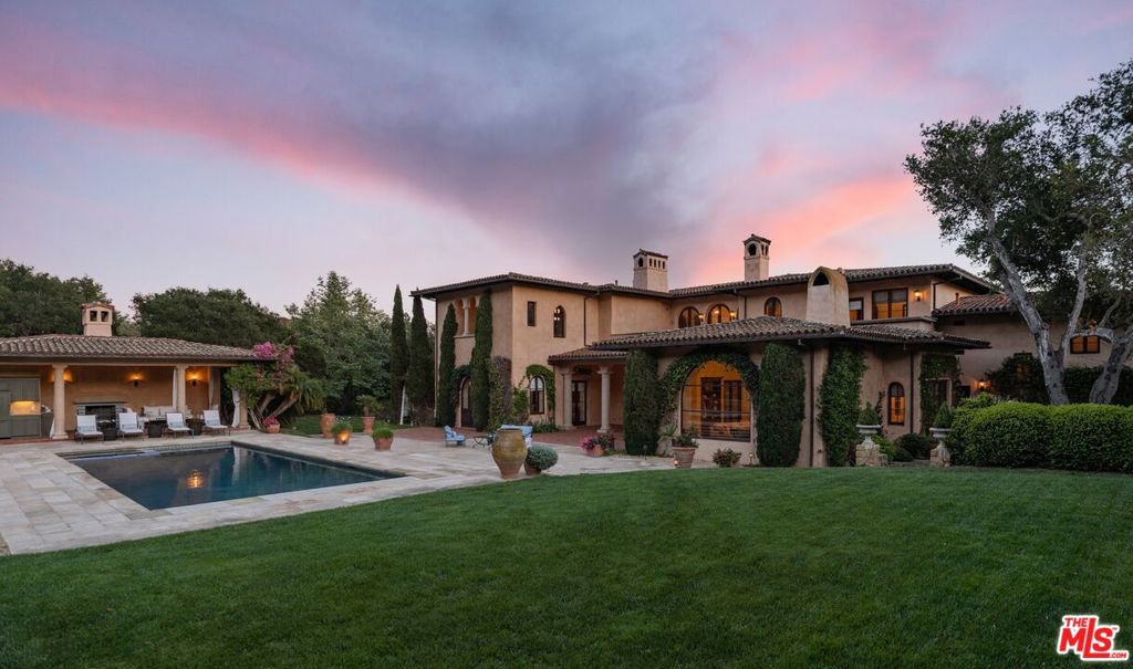 Tucked peacefully within one of Montecito's most sought-after neighborhoods, this exquisite Italian Villa awaits showcasing gorgeous mountain, setting and ocean views. A strategic combination of grace, scale, romance, privacy, and comfort, the picturesque approx. 2-acre estate features a custom built 5 bed + du-al office, 6.5 bath residence, serene pool and spa, spacious loggia with fireplace, full bath and wet bar, putting green, built-in BBQ, multiple dining and entertaining terraces, dual gated entry, and gorgeous landscaping inclusive of mature oaks, fruit trees, a tranquil waterscape and vibrant flora. Designed by locally esteemed architect, Robert Senn, and brought to life by highly regarded Becker Construction, the property ignites a genuine, romantic Italian feel by successfully celebrating all aspects of life through a carefully curated layout designed with the intention of spending time with friends and family, providing countless entertaining and dining venues, and capitalizing on the stunning natural setting and exceptional views which encompass the estate, all the while being perfectly tailored to Montecito's beloved indoor-outdoor lifestyle. Inspired by elements of nature and the Italian countryside, the commanding residence boasts natural materials including French, Italian and Jerusalem split limestone, Terracotta, marble, and walnut. Additional details include intricate groin and barrel-vaulted ceilings, handmade light fixtures from Murano, Italy, and radiant heat throughout. The gourmet kitchen features Thermador appliances, marble countertops, spacious island with additional seating, walk-in pantry with built in shelves, and opens to a generous sitting room and nearby bar. Multiple dining venues allow for both informal and formal gatherings and flow seamlessly to both the home's interior living spaces and exterior amenities. The superior primary suite rivals that of the nearby San Ysidro Ranch with its sparkling ocean, island and mountain views, dual walk-in closets with abundant and thoughtful built-in cabinetry, and lavish en-suite bath inclusive of a large sauna, soaking tub, separate shower, dual vanities, and private balcony. One of the home's 4 guest bedrooms serves as an ideal guest suite as it has an optional private exterior entrance in addition to its convenient interior access and features a wet bar, en-suite bath, and large walk-in closet. This magnificent Italian villa is located convenient to the best of Montecito including San Ysidro Ranch, the Rosewood Miramar, Montecito Club, the upper and lower villages, Miramar and Butterfly beaches, and renowned hiking trails. The property is also located in the highly sought-after Montecito Union School District.