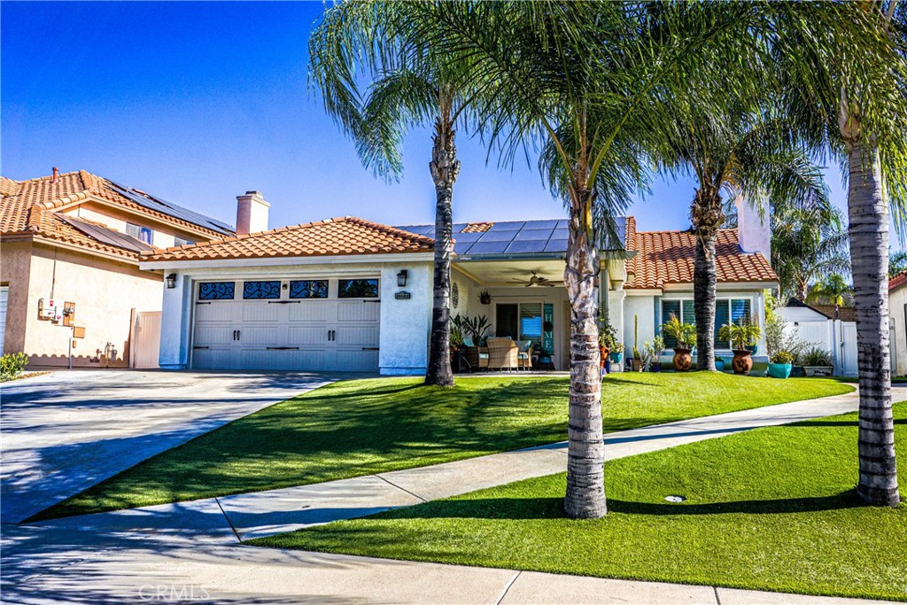 Welcome to 35182 Momat Ave, Wildomar, CA 92595! This stunning single-story residence offers a perfect blend of comfort and style. The front yard features low-maintenance turf, while the backyard boasts a beautifully designed hardscape concrete area, ideal for gatherings and entertainment. With four bedrooms and two full bathrooms, this home provides ample space for a growing family. Additionally, there's a convenient half bath located outside, ensuring easy access while enjoying the sparkling pool. The pool is equipped with a state-of-the-art saltwater system and can be effortlessly controlled via the Intellicenter2 phone application. Motorized shades with remotes and Alexa voice-enabled capabilities add a touch of modern convenience. Experience enchanting evenings with LED landscape lighting in the backyard, complete with app-controlled color changes. The roof and windows have been recently replaced, featuring double-pane argon gas windows for energy efficiency. This home boasts a range of additional upgrades including a whole-house quiet cool fan, a top-of-the-line water filtration system providing alkaline water, and an 18 seer HVAC system for year-round comfort. The exterior has been freshly painted, and both front and back yards feature newly installed Alumawood insulated patio covers. A brand-new garage door adds to the overall curb appeal. For tech enthusiasts, Cat 5 ethernet wiring is integrated throughout the house. Enjoy immersive audio with in-wall Definitive Technology home theatre speakers. This residence at 35182 Momat Ave is a testament to comfort, style, and modern living. Don't miss the opportunity to make it your own!
