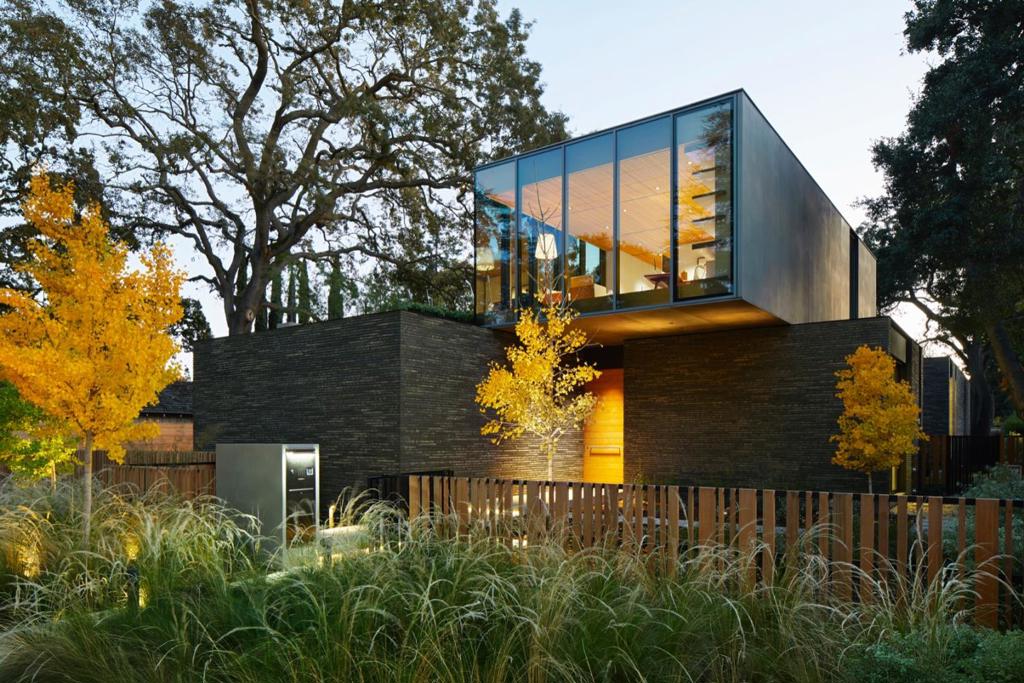 Designed by acclaimed architecture firm EYRC and built by MatPel, this spectacular Old Palo Alto home is the epitome of exquisite craftsmanship. Situated on one of the best blocks in Old Palo Alto on a total of 21,506 sq-ft lot and nestled among oak tree canopies, this three-level floor plan boasts a stunning open kitchen with a custom-designed wrap-around that separates the kitchen from guest hosting areas. A 700 bottle wine cellar with adjacent tasting/game room and bathroom, attached 2-car garage, and roof deck overlooking the private rear yard. A guest house connected to the main house by an exterior trellis, features a spa-like suite for guests with kitchenette, a large gym/yoga studio and a detached 2-car garage (total of 4-car garage). The property is situated on 2 parcel numbers: main house is on parcel APN 124-13-011 (1934 Waverley, 10,971 sq-ft) and guest house on parcel APN 124-13-012 (1936 Waverley 10,535 sq-ft).