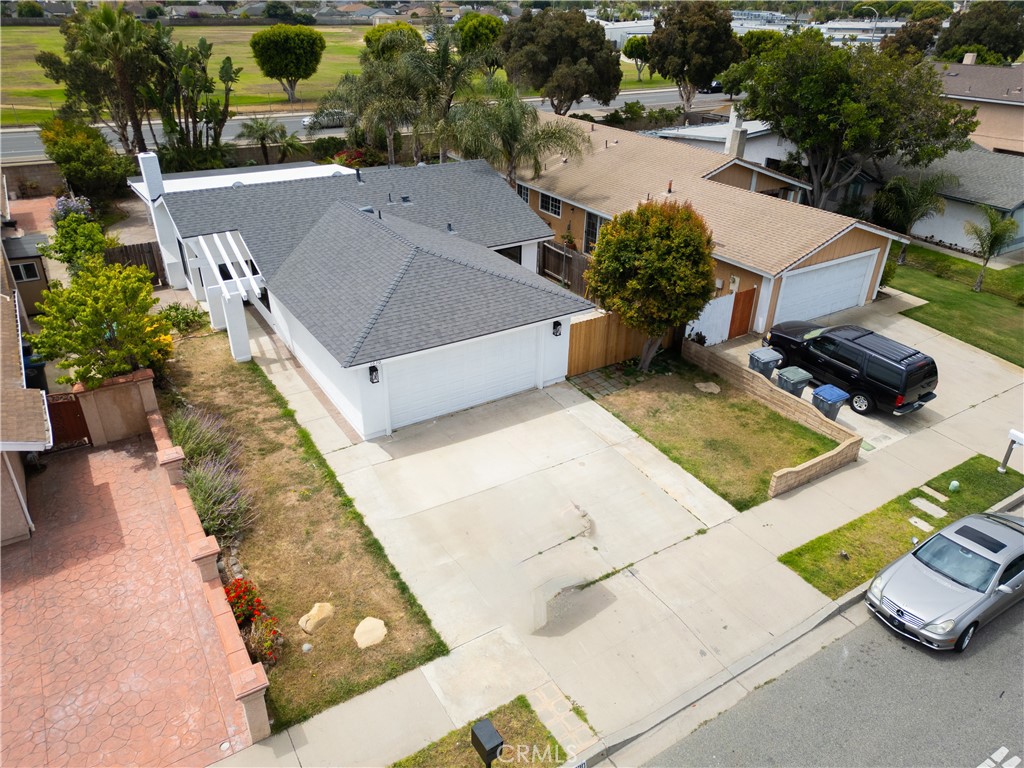 Beautifully Remodeled Home in College Estates! This move-in ready home features high-end finishes, a stunning kitchen, remodeled bathrooms, new dual-pane windows, and a permitted new roof with warranty. The expansive backyard is perfect for entertaining, relaxing, or creating your dream outdoor space. Located on a peaceful, tree-lined street in Oxnard. A large driveway provides parking for 3 cars, plus a spacious 2-car garage with a dedicated laundry area. Great Location! Short drive to Hueme Beach.