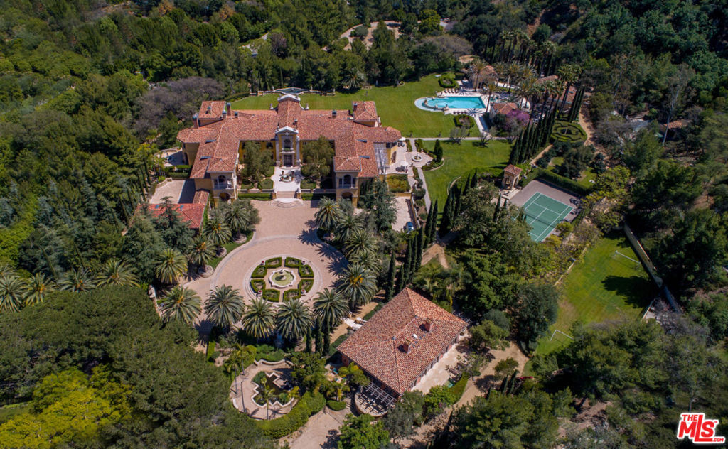 Located in Secure Gated and Guarded Beverly Park, Villa Firenze sits on 9.85 acres mostly flat and includes lots 67, 68 and 69 Beverly Park, probably priced at land value. Gated Stone entry to one of the Great Estates of Los Angeles with Huge Massive Rooms and Acres of Private Grounds! Large Motor Court with Central Fountain. Stone steps to Main Villa with Massive Public rooms, 20' ceilings and Antique Stone Fireplaces. Living Room overlooks acres of grassy yard. Two story Rotunda Library/Office with secret passage to Master and Lavish Den w Bar. Open Kitchen to Large Family Room with Screening and Fireplace. Very Large Formal Dining Room plus family dining off of Kitchen. Upstairs, Huge Primary Suite with dual lavish Baths and live-in Closets each with a separate office. Five Family Bedrooms each with en-suite bath plus upstairs family/media Room. Fully equipped Gym, gift wrapping room Library and more! Across the Motor Court a Villeta Firenze, a Separate Guest House with two bedrooms with en-suite baths, Kitchen, powder room and Private Patio and Spa. Lighted Tennis Court with extravagant stone seating area. Separate Pool Compound consisting of 2 Bedroom Pool House, Cabana with Open Kitchen and entertainment area and Pool Baths and Dressing Rooms. Basketball half Court, Practice Soccer field, Child's maze and all surrounded by a wide jogging trail. House Manager's and maintenance offices, workshop and endless storage. Several parking lots plus motor court parking. A Private and Complete Estate for those who value privacy and security!