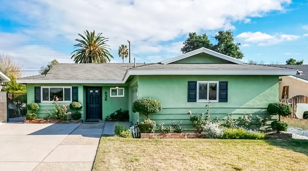 Gorgeous four bedroom two bath remodeled home in Glendora School District. Wide driveway at end of street leads you to this family home with beautiful curb appeal. Formal entry welcomes you to formal living room with fireplace and wood floors, open remodeled kitchen with newer cabinets, granite counters, stainless appliances, dining area with slider door to outside covered patio, master suite with remodeled master bathroom with shower, three additional bedrooms, and a remodeled hallway bathroom. Home features: wood floors, dual pane windows, and some plantation shutters. Private backyard with covered patio, and firepit. Two car attached garage with direct access into house. Laundry is located in garage.