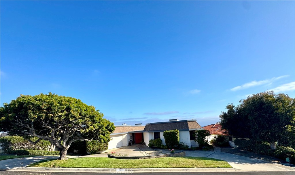 Positioned at one of the highest elevations in Monarch Bay, this prime parcel offers 200-degree wraparound views stretching from Salt Creek’s rolling waves to Catalina Island and up the SoCal coastline. With only a few neighboring lots rivaling this vantage point, the setting is unparalleled. The existing mid-century residence spans approx. 3,547 sq ft on a ~0.26-acre lot and is ripe for transformation—whether a renovation or ground-up custom build.
The current single-level layout includes an ocean-facing living area with vaulted ceilings and fireplace, a spacious primary suite, and two guest bedrooms. The lot offers ample room to create your dream outdoor living space—all against a dramatic coastal backdrop that changes by the hour.
• Exclusive membership with equity ownership in the Monarch Bay Beach Club (managed by the Waldorf Astoria)
• Private beach access, towel and chair service, oceanfront dining & beach butlers
• No HOA dues
• Monarch Bay’s “concierge-style” no-charge services include:
o Newly installed fiber optic internet
o Trash roll-out & pick up
o 24/7 guarded credentialed access + 24/7 security patrol
o Many seasonal community events!
• New private park featuring tennis, pickleball, dog park, and play structure