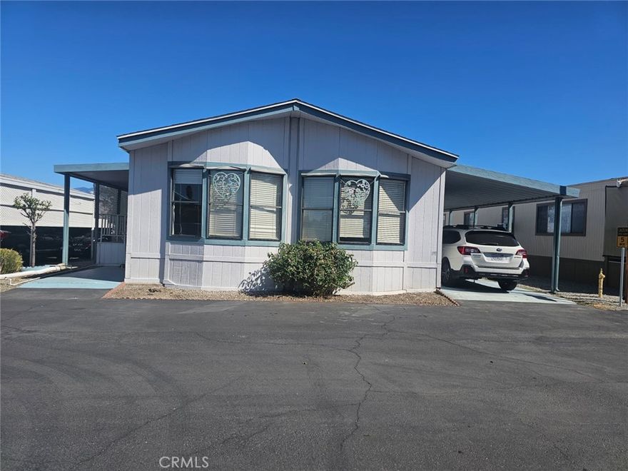 Unit 36: A 2- bed / 2- bath Mobile Home. 1056 sq ft. Built in 1987 Carport for 2