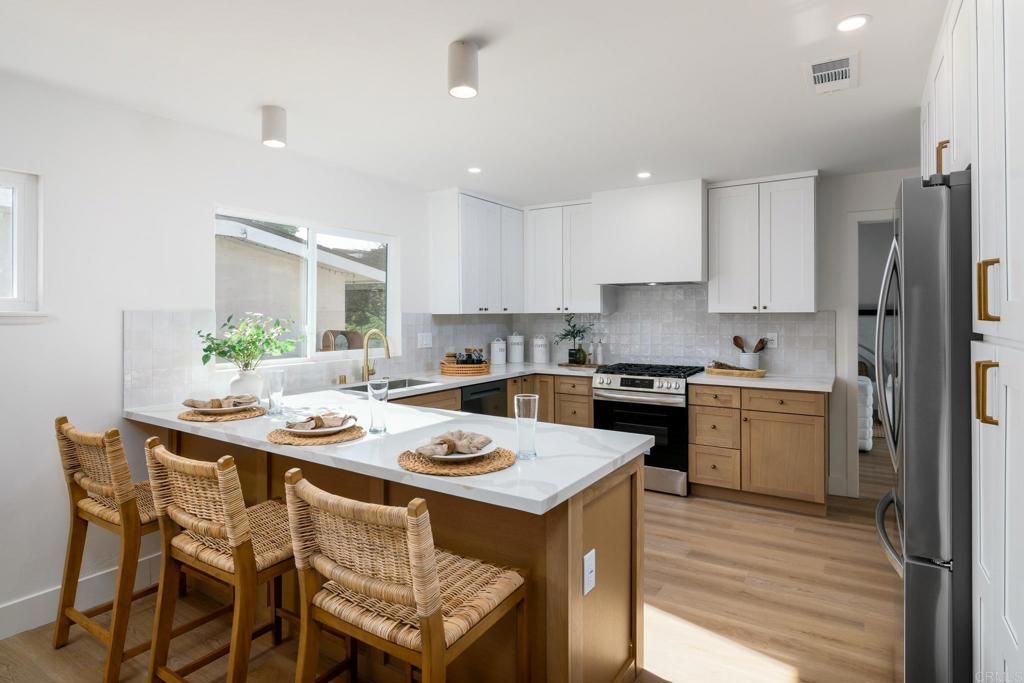 Photo of 2728 Russmar Dr Dr, San Diego, CA 92123 (MLS # PTP2509224)