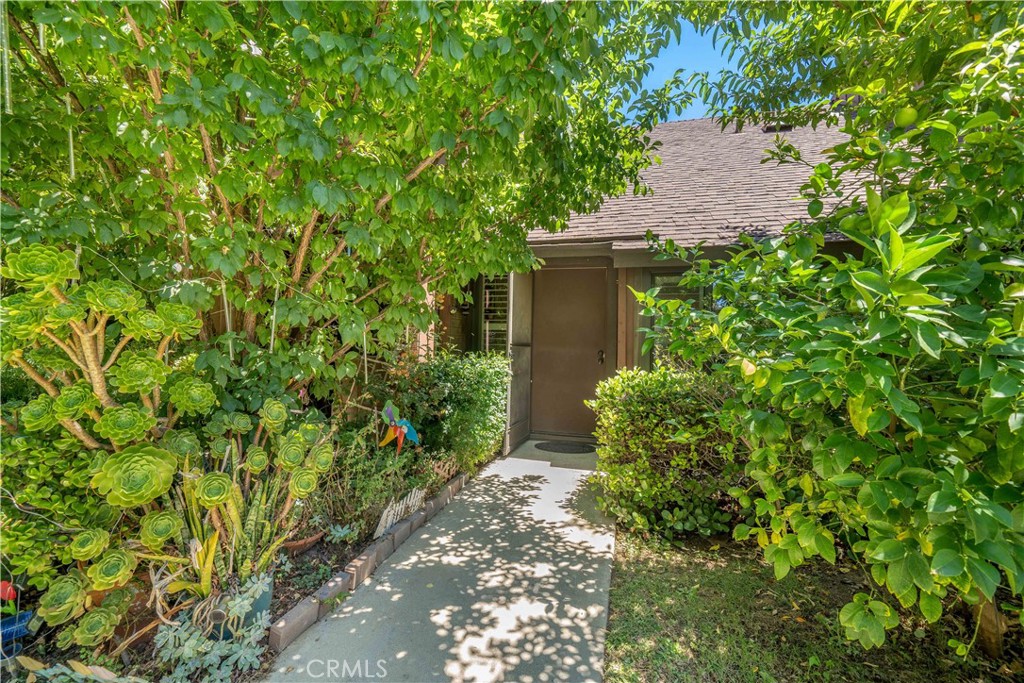 Beautiful Winnetka Townhome with soaring ceilings and abundant light! Step through your front door to a large open living room with tall ceilings and ample natural light. Cozy kitchen leads to charming sizeable patio and then out to your private 2 car garage. Downstairs also features one bedroom and a full bath. Second bedroom is a very large loft located upstairs with its own ensuite bathroom and spacious walk-in closet. This super cute little neighborhood is like an oasis in the desert with park like grounds, sparkling community pool, lots of guest parking and it’s located right in the center of town! Quick drive to 101 and 118 freeways. Park across the street has tennis courts and children's playground. Easy access to Malibu Beaches, and nearby shopping in Woodland Hills / Ventura Blvd. This one will go fast! So schedule your tour today!
