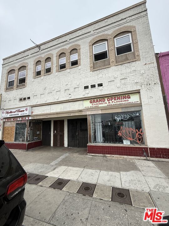 Rare mixed-use investment in Wilmington featuring 6 updated residential units over 2 ground-floor commercial spaces. One retail unit is currently leased to a long-standing flower shop; the other is vacant and ready for a new tenant or repositioning. Property offers stable income, separately metered units, and a newer roof. Zoned LAC2 with great visibility along Anaheim St. Ideal opportunity for investors looking to add value, raise under-market rents, or complete a 1031 exchange. Close to the Port, local businesses, and major transportation corridors. Please do not disturb tenants drive-by only.