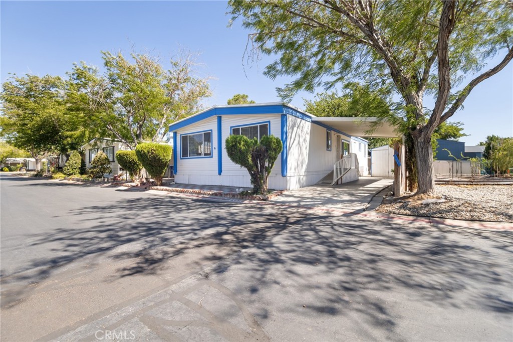 Welcome to 3524 East Ave R #6 in Palmdale, an updated and move-in ready 3-bedroom, 2-bathroom home boasting 1,272 square feet. This home offers a perfect blend of modern upgrades and comfortable living spaces. Step inside to discover upgraded wood-like flooring throughout, creating a warm and inviting atmosphere that flows seamlessly from room to room. The kitchen features granite-like countertops, providing ample workspace and a stylish finish that’s ideal for preparing meals or entertaining guests. Both bathrooms have been thoughtfully upgraded with contemporary fixtures and finishes, combining functionality with elegance. The home’s layout maximizes natural light and space, offering a bright and airy feel in every room. Outside, the sizable lot provides plenty of room for gardening, outdoor activities, or future expansions. Located in a vibrant Palmdale community, this home is close to shopping, dining, parks, and schools, making it an ideal choice for families or anyone seeking a comfortable, upgraded home in a convenient location. With its modern touches, functional layout, and expansive lot, 3524 East Ave R #6 offers a lifestyle of comfort, convenience, and charm.