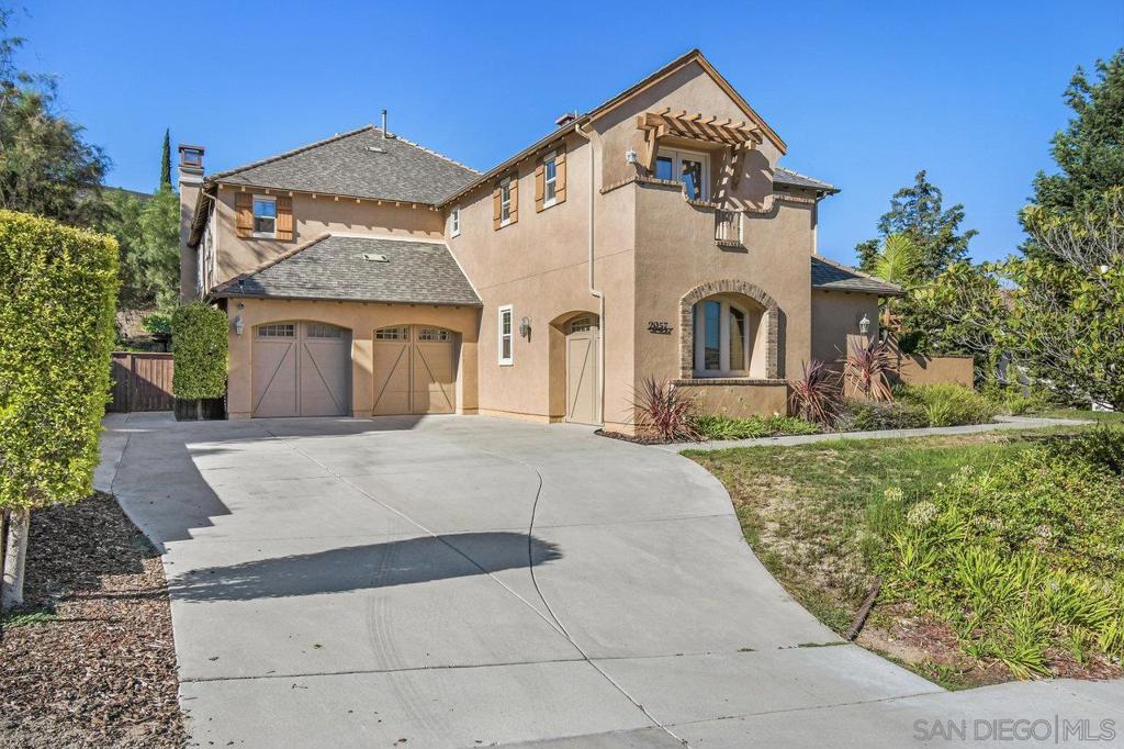 Welcome to your private sanctuary in one of Eastlake’s most prestigious gated communities. This home features 5 bedrooms plus an optional room, 6 bathrooms, and a builder-designed two-story guest house with its own kitchen and AC. The main residence showcases a gourmet kitchen with granite countertops, stainless steel appliances, walk-in pantry, and a spacious island that opens to the family room. Enjoy dramatic high ceilings, a serene primary suite with a private balcony overlooking the expansive backyard, and a 3-car garage with epoxy floors. An entertainer’s dream with room for multi-generational living.