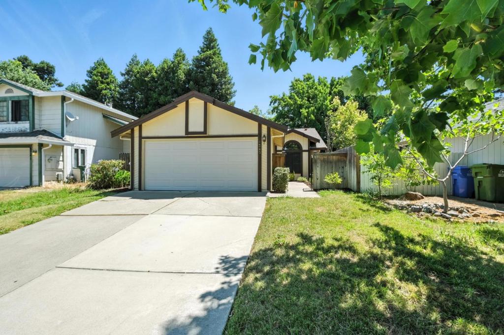 Private Retreat in the Heart of Town! This 2-bedroom, 2-bath home is perfectly located near parks, shopping, restaurants, Costco, and Target. With granite countertops, laminate and tile flooring throughout, and vaulted ceilings, this home offers both style and comfort. The living room features a cozy fireplace, and an open design that maximizes space in the home. The separate laundry room just off the kitchen offers tons of extra storage and adds convenience. Outside, you'll find the private covered patio and fenced side yard. The fully finished and insulated garage is complete with a workbench, perfect for hobbies or extra storage. Whether you're just starting out or looking to downsize, this home is a great fit. Enjoy easy living in a prime location!