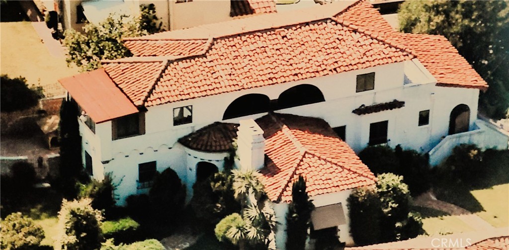 This Spanish-style, 1929 4 bd/3 ba hilltop residence with stained glass windows captures the magnificent architectural features of a by-gone era. A 2-car detached garage has an upper deck that beckons visitors to linger & take in the city view. A brick walkway leads to the turret-style entry. Frontage on two streets provides panoramic views. Addresses on two streets could provide possibilities for expansion. Step inside and take a 3D tour of this amazing residence. You'll be glad you did!
The step-down lvg rm with beam ceiling, gas FP, & direct access to a covered veranda. Arched doorway in the formal DR leads to a solarium & gated patio. Also on the 1st flr are 2 bdrms (with views), 2 bathrooms, kitchen, breakfast rm with bay window, & laundry rm. Off the laundry room is another gated porch entry to the 2nd street. Back yd has privacy hedge & avocado, grapefruit, persimmon, loquat, & Chinese date trees.
Viewing lounge on 2nd floor has two, large arched windows that provide a view east towards Kellogg Hill & San Jacinto Mtns. This viewing lounge is a great place to enjoy an indoor meal while gazing at the city lights. A shared bathroom is opposite the viewing lounge. At each end of the viewing lounge are 2 small cedar closets.
The 2 bdrms offer their own views. The bdrm with an art studio/retreat has easterly views. The retreat provides a similar easterly view but also southwesterly views towards Long Beach. The picture window in the 4th bdrm has views of Mt. Wilson, San Gabriel Mtns, & city lights. The westerly view of the horizon, towards the distant Hollywood Sign, gives the opportunity for stunning evening sunsets. A wet bar allows for the convenience of morning coffee or evening drinks on the private covered balcony that extends the length of the room.
Numerous restaurants & services are within walking distance. The property is within minutes of the 10, 60, 5, and 710 Fwys & < 10 mi from Union Station & downtown LA. It is located within the highly coveted Brightwood Elementary & Mark Keppel High School Districts.
3 ductless units appear operational. Bsmt HVAC unit not functional.
First time on the mkt in over 50 yrs. Those who enter are often in awe of the architectural beauty, inspired by the potential, and mesmerized by the expansive views from almost every room. The home's relaxed and peaceful energy make it an ideal place to live, unwind, and entertain. Don't miss this opportunity to make this house your home.