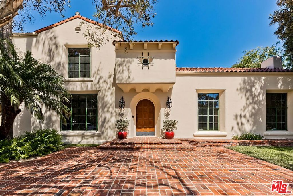 This exquisite classic Spanish estate is located on a quiet street in the prime area of Beverly Hills flats. Featuring a beautifully renovated interior and exterior true to the original integrity of the architectural feature of the 1920's, including metal casement windows and French doors, hardwood and Spanish tile floors throughout. The main level of this two-story home includes an inviting living room with high beamed ceiling and updated kitchen with Miele appliances. Another highlight of the house is a large solarium a glass roof that opens with the push of a button, providing a relaxing atmosphere while listening to the tiled fountain and enjoy your evenings with the radiant heated floor. The French doors of the solarium open to the backyard with its pool and professionally landscaped grounds, providing for true indoor and outdoor living in the heart of Beverly Hills. This is a probate sale by conservator and will need court approval and is subject to a bidding process. Court hearing is 12/16/24.