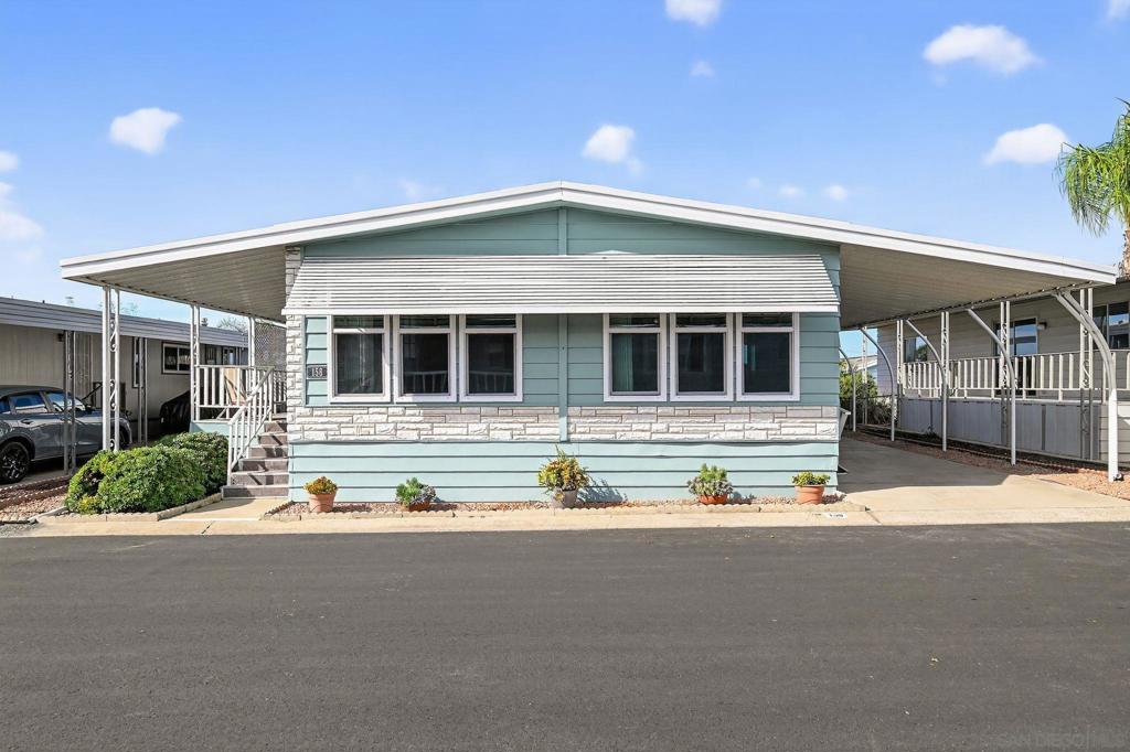 Beautifully remodeled home in Ramona Terrace estates. This move-in ready 2 bed, 2 bath home has been upgraded with quality features including all new vinyl high-efficient windows and slider. Also the kitchen was upgraded with shaker style soft close cabinets, quartz countertops, new stainless appliances and subway backsplash. New flooring throughout is luxury vinyl planks for easy maintenance. Primary bath is large with custom tile shower and dual vanity. Fresh paint makes this the most desired home in the park. Nothing left to do except move in. Located in a well-kept 55+ community with clubhouse, pool, and convenient access to downtown Ramona. Offered at $179,000 - a fantastic value for a turn-key home in this desirable park.