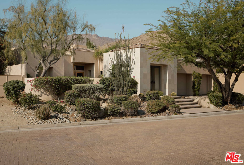 Established into the sculptural landscape of the exclusive Bighorn Golf Club, 204 Metate Place is the contemporary desert retreat that balances clean architectural disciplines with a natural warmth integral to the California Desert. Situated on the Mountains Course (12th hole) with the highly coveted South facing position, this fairway home is framed by walls of glass, while the interiors welcome soft light and sweeping views of the San Jacintos, creating this continuous dialogue with the surrounding terrain. The open-plan great room serves as the central gathering space, featuring high ceilings, a clean-lined fireplace, and a mix of materials that add both texture and warmth. The kitchen and dining area are thoughtfully designed with simple forms and natural finishes, offering a relaxed setting for both everyday living and entertaining. In the primary suite, sliding glass doors open to a terrace where the pool catches the warmth of the afternoon sun. Every room is intentionally oriented to showcase the landscape, reinforcing the seamless connection between indoor living and the desert environment. Minutes to El Paseo (The Desert's version of Rodeo Drive), Bighorn Golf Club is globally considered to be one of the most luxurious and prestigious private desert communities in the world, offering two championship golf courses, a new clubhouse, seven dining options, and several pickleball and tennis courts.