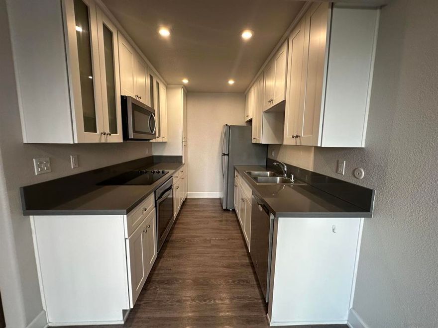 Available for immediate move in in La Jolla!  Move right into this first floor condo in turnkey condition.   It has been upgraded with modern white cabinets, grey countertops, vinyl planks, modern mirrored closet doors, wall-to-wall closet in bedroom, dual pane windows, A/C and more.   Easy access to I-5 and SR-52.  Villa La Jolla offers 2 swimming pools, 2 spas, a fitness center and a clubhouse.