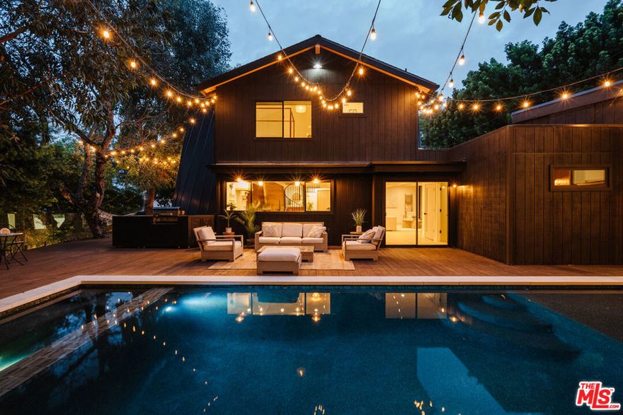 A Show-Stopping Modern A-Frame Retreat in Studio City! This one-of-a-kind A-Frame stunner is where sleek design meets effortless indoor-outdoor living. Completely reimagined with all-new interiors, this home is an entertainer's dream. Featuring multiple outdoor lounge and dining areas, a sparkling private poo and jacuzzil, cozy fire pit, and a built-in outdoor kitchen, perfect for warm LA nights. The main house offers 4 spacious bedrooms and 3.5 beautifully appointed baths. An attached guest house with its own private entrance, full bath, and dedicated parking adds incredible flexibility. Ideal as a 5th bedroom, home office, gym, or recording studio. Whether you're looking for a luxurious long-term residence or a fully furnished short-term escape, this turnkey property is ready to impress. Available September 1st. Don't miss your chance to live in one of Studio City's most unique homes!