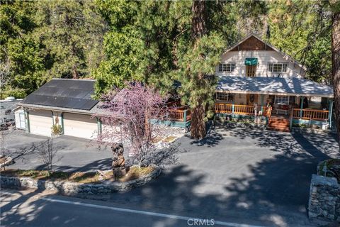 Photo of 41208 Valley Of The Falls Drive, Forest Falls, CA 92339 (MLS # IG25070301)