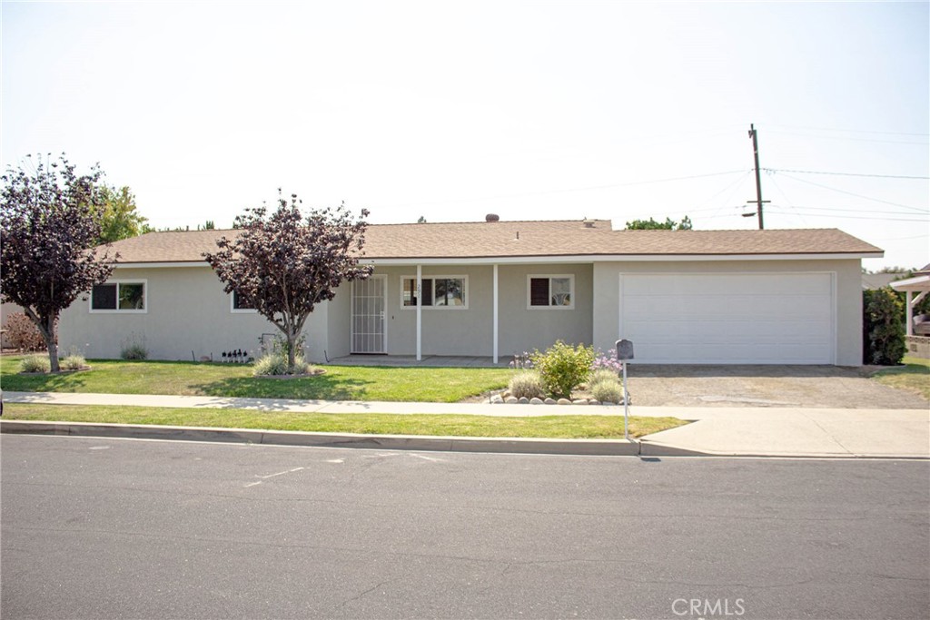Desirable 3 bedroom, 2 bath single story home on large lot. New luxury vinyl plank Flooring, Carpet and Paint throughout. Remodeled Kitchen with recessed lighting, includes refrigerator, stove/oven, dishwasher, microwave, granite counter tops and ceiling fan above eating area. Living room and separate family room. Family room has Turbo Air A/C wall unit. 2-car garage with laundry area includes washer & dryer. Large covered patio off of living room and family room. Back yard is ready for your custom landscaping personal touch. No HOA. Welcome home!
Trust sale, home to be sold in it's AS-IS condition.
