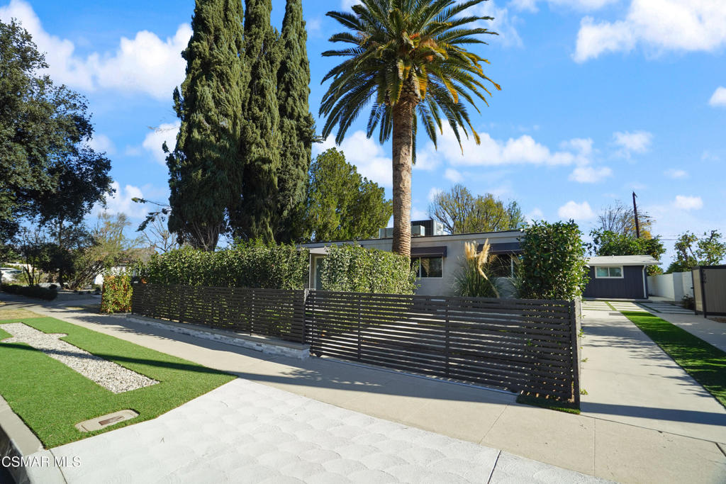 Welcome to this exceptional West Hills property, featuring a beautifully renovated main home and a brand-new private ADU, offering the perfect blend of modern living, comfort, and flexibility.The main residence boasts 4 bedrooms and 2 bathrooms, with a bright and airy open floor plan filled with natural light. Enjoy a recently updated kitchen with sleek countertops, stainless steel appliances, and a new washer and dryer. Spacious living areas flow seamlessly to the outdoors, creating an ideal space for both relaxing and entertaining. The backyard is a true retreat with drought-tolerant landscaping, mature fruit trees, and a cozy firepit area--perfect for enjoying warm Southern California evenings.The newly built 2-bedroom, 2-bath ADU offers its own private entrance, enclosed yard, and covered patio, along with dedicated parking, a stylish kitchen, and in-unit laundry. Thoughtful high-end finishes and abundant natural light make this space a luxurious, private sanctuary.If you've been looking for a property that allows for multi generational living or flexible space, this it it! The entire property is fully gated for privacy and security and is conveniently located near Topanga Village, Westfield Topanga, Calabasas Commons, and major freeways, providing easy access to shopping, dining, and entertainment.This rare offering combines modern updates, flexible living arrangements, and a serene outdoor escape in one of West Hills' most desirable neighborhoods.