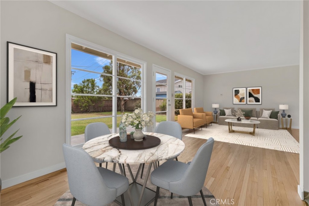 Nestled in the heart of Garden Grove, this beautifully updated single-family home blends modern comfort with timeless appeal. From the moment you arrive, the curb appeal captivates—mature, stately trees frame a lush front lawn, complemented by a freshly painted exterior and a welcoming covered porch.Step inside to discover sun-drenched living spaces with refinished hardwood floors that add warmth and character throughout. The kitchen shines with crisp white cabinetry—some with stylish glass accents—sleek stainless steel appliances, and convenient access to an indoor laundry room. Additional updates include a freshly painted interior and a detached two-car garage, offering ample storage and parking. But the true gem of this property is the expansive backyard. Situated on a generous 7,350 sq ft lot, it’s a blank canvas—perfect for creating your dream outdoor retreat, garden oasis, or entertainment space. Centrally located with quick access to the 22 Freeway, and just minutes from local shops, dining, and parks, this home offers the best of comfort, convenience, and potential. A must-see opportunity you won’t want to miss! Don't forget to visit the virtual tour athttps://my.matterport.com/show/?m=1KLeqapsQCz&brand=0&mls=1&