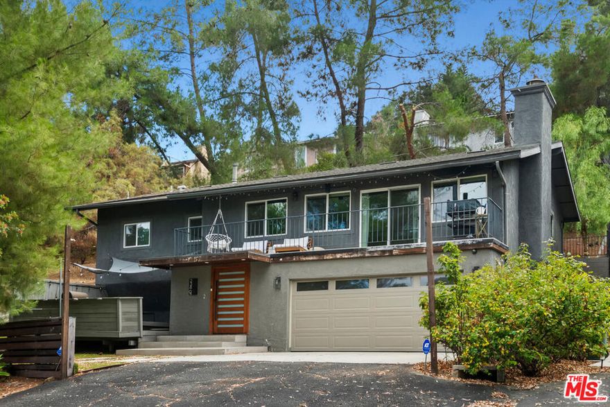 Welcome home to your Calabasas retreat! Discover this beautifully updated 3-bedroom, 2-bath home offering stunning treetop and canyon views. The open-concept floor plan is filled with natural light and features a spacious great room with a cozy fireplace that flows effortlessly into the dining area and kitchenperfect for everyday living and entertaining.The kitchen showcases sleek quartz countertops, stainless steel appliances, and generous cabinet and counter space. Both bathrooms have been tastefully remodeled with quartz finishes and classic subway tile. The primary suite impresses with high, beamed ceilings and a wall-to-wall closet.Step outside to your private balcony or outdoor deck to enjoy your morning coffee or soak up the California sunshine. Additional highlights include recessed lighting throughout, an attached two-car garage with direct access, and a large driveway providing ample parking.Situated in the highly rated Las Virgenes School District, this home is moments from Calabasas High, A.C. Stelle Middle, and Chaparral Elementary, as well as the Calabasas Commons, scenic hiking trails, and just a short drive to Malibu's beaches.**some pictures have been VIRTUALLY STAGED** - the King size bed frame, dining table and chairs, the peloton bike can remain in the home if the renter wants to use it.
