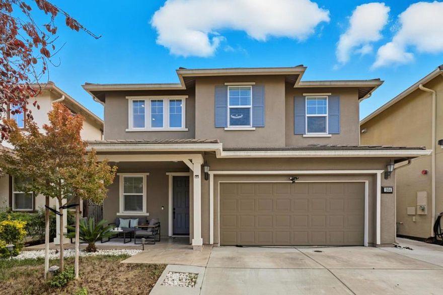 Welcome to 264 Windsong Way in Gilroy, a beautifully updated 4-bedroom, 3-bathroom home that seamlessly combines modern style with everyday comfort. The open and airy interior features high ceilings, rich hardwood floors, custom wall paneling, and designer-painted walls throughout, creating a bright and inviting atmosphere. The kitchen showcases modern cabinetry, sleek hardware, updated granite countertop, and a new island pendant light perfect for both daily living and entertaining. Bathrooms feature contemporary finishes, while the family room centers around a cozy gas fireplace that adds warmth and charm. Step outside to enjoy a private backyard designed for relaxation and gatherings, complete with a pergola that provides shade and an ideal space for entertaining, low-maintenance artificial turf, and no rear neighbors. Serene views and HOA-maintained green areas, walkways, and sidewalks enhance the sense of community. Energy-efficient 8,000 KW paid-off solar panels and tankless water heater help reduce utility costs, adding to the home's overall value. Perfectly situated near scenic trails, shopping, dining, & within the desirable Rucker Elementary and Christopher High School boundaries, this home offers comfort, style, and convenience, making it a perfect place to call home.