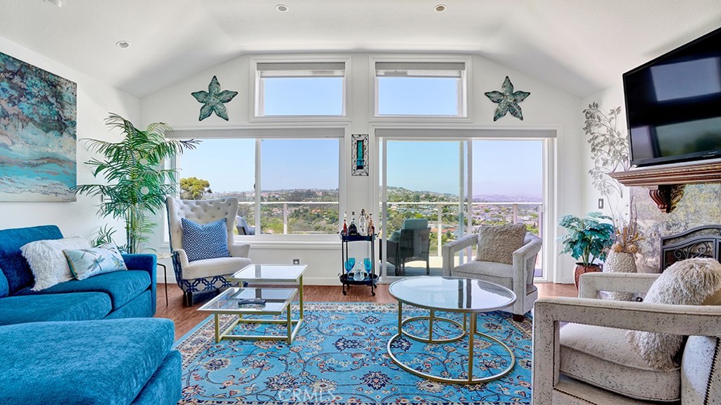 This sophisticated coastal home offers a perfect blend of style, comfort, and location—making it an ideal full-time residence or a luxurious second home. Situated just minutes from Dana Point Harbor, Lantern Village, and favorite coastal shops and restaurants, you'll love the convenience of owning a home in the gated-community of Waterford Pointe. This residence is perfect for entertaining with the entire entry floor dedicated to dining and living spaces - which feature the impressive 180-degree panoramic scenic city and mountain views. Enjoy the view with ease with remote/automated blinds.
This home shines with thoughtful updates and elevated finishes throughout. New dual-pane Pella windows (2021) with a transferable warranty, plus fresh interior paint, and updated flooring create a fresh and inviting atmosphere. Elegant lighting includes chandeliers, pendants, and recessed fixtures—adds warmth and sophistication in every room. The remodeled kitchen (2014) includes a range which allowed for the addition of a custom pantry and microwave closet, not typical for this model. Kitchen also features quartz countertops, soft-close cabinetry, and a basketweave mosaic backsplash. Bathrooms have also been tastefully remodeled, with the primary suite offering a spa-like retreat featuring a freestanding soaking tub, tiled shower, and a dual vanity topped with quartz. Additional upgrades include copper repipe (2022), addition of A/C (2022), and a new furnace (2020). With HOA dues at just $280/month, this curated retreat offers low-maintenance luxury in one of Dana Point’s most desirable coastal communities.
