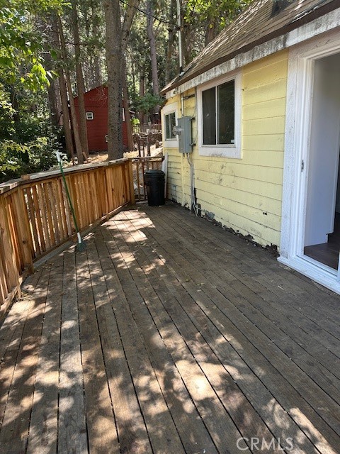 This is an updated one-bedroom, one-bathroom Unit. The kitchen cabinets, counters, and stove are all new. The flooring was also just installed. There is a mini split that has AC/Heat. There is a nice deck off the living room, with a seasonal stream close by for relaxing.