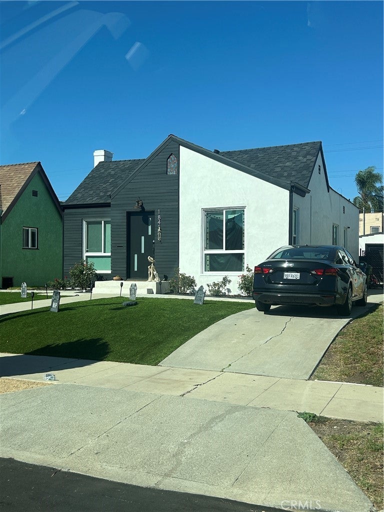 Photo of 1841 W 70th ST, Los Angeles, CA 90047 (MLS # SB26226586)