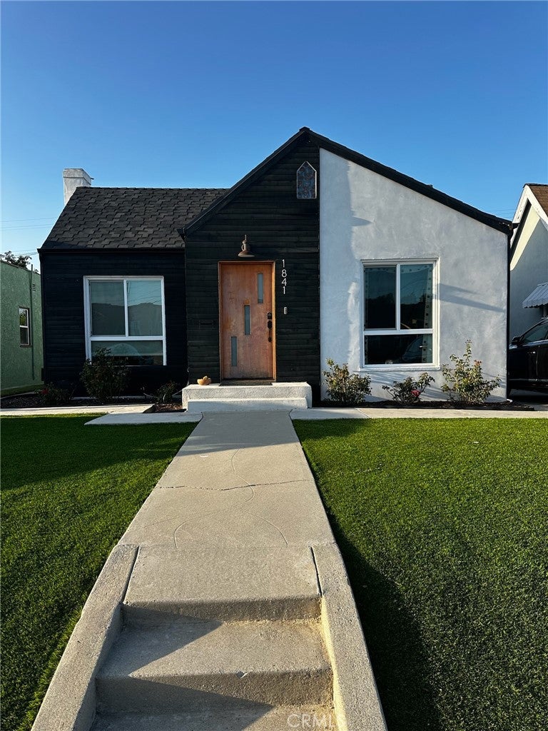 Photo of 1841 W 70th ST, Los Angeles, CA 90047 (MLS # SB26226586)