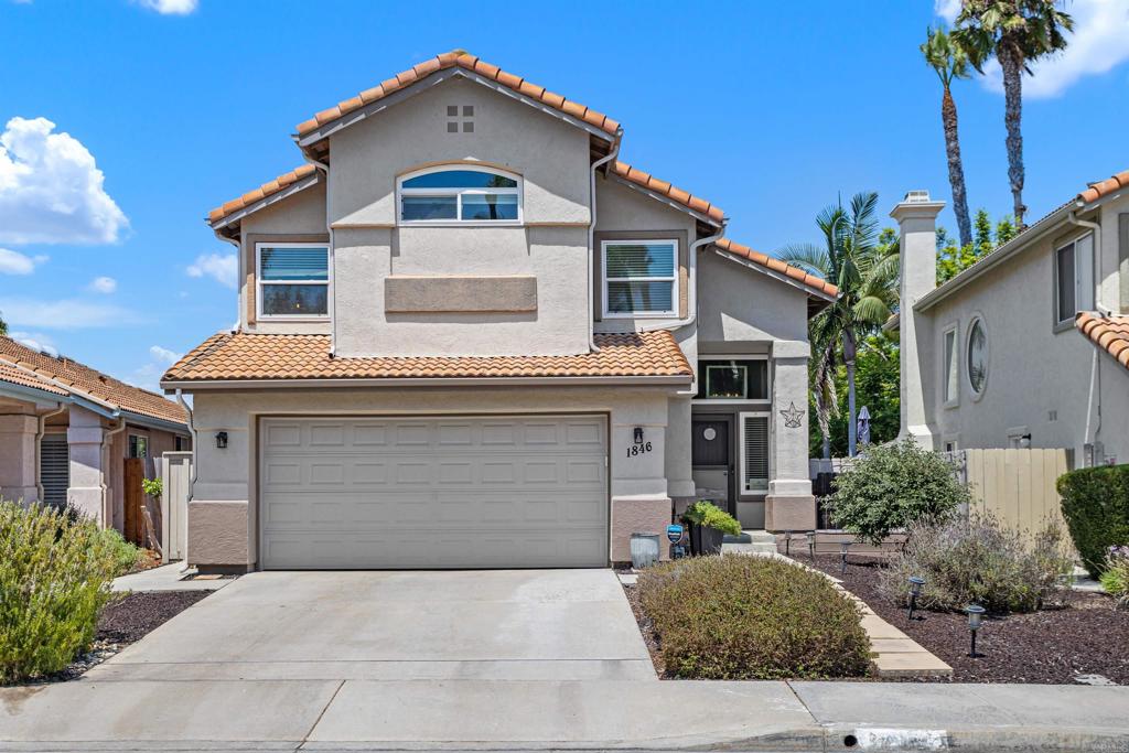 Step Into a World of Refined Beauty in Rancho Del Oro! Every detail of this modern farmhouse 3-bedroom, 3-bathroom home tells a story of craftsmanship and effortless living. From the moment you arrive, you'll notice the beautiful low maintenance landscaping and the quaint wood front porch, ideal for sipping your morning coffee. This beautifully updated home has been meticulously upgraded inside and out! Inside you will discover an open and flexible layout designed for both relaxation and entertainment. At the heart of the home is a magazine-worthy kitchen, featuring expansive granite countertops, a breakfast bar, custom cabinetry, a high-end stainless Steele Fisher & Paykel stove, recessed lighting, unique pendant lighting and a beautiful subway tile backsplash. Entertain with ease in the inviting living room/dining room, where the smooth real French white oak hardwood feels luxurious underfoot and custom reclaimed barn doors bring rustic charm to every gathering. The family room is conveniently located next to the kitchen and features real French white oak hardwood flooring. A gorgeous gas fireplace enhanced with beautiful Crossville white beadboard tile and adds warmth and elegance to the space. Ascending the staircase, which is complemented by French white oak wood flooring, you will arrive at the primary suite which is spacious and has mirrored wardrobe closet doors with built-ins. The primary bathroom offers a spa-like ambiance, featuring a dual vanity, Italian Calcutta leathered tile slab countertops, heated hexagon tile floors by Schluter, shiplap accent walls and a reclaimed barn door. The shower has subway tiles, a doorless dam less shower door with hexagon tile flooring and a Bluetooth speaker/fan with a freestanding tub surrounded by subway tile around the walls. There are also two secondary bedrooms with French white oak hardwood floors, each offering ample natural light and generous closet space. The remodeled bathroom features modern fixtures, granite counters and a beautiful shower adorned with white subway tile. There is also a dedicated custom-made laundry cabinet in the hall including a dedicated laundry room on the first floor. The tranquil and low maintenance backyard features a new gas fire pit that provides cozy warmth on cool evenings, and a metal patio cover with a heater, making it perfect for year-round outdoor entertainment. Last but not least, the garage offers plenty of shelving and baskets from the Container Store, as well as built-in storage cabinets and we cannot forget the energy efficient leased Solar system and Air Conditioning! NOTE: There are too many upgrades to list so please see the UPGRADE LIST in the Document Section.