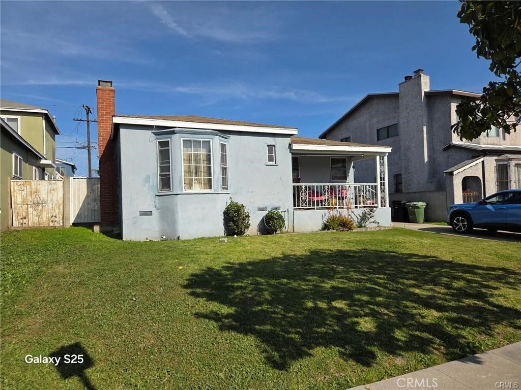 Photo of 10404 S Gramercy Place, Los Angeles, CA 90047 (MLS # DW25193605)