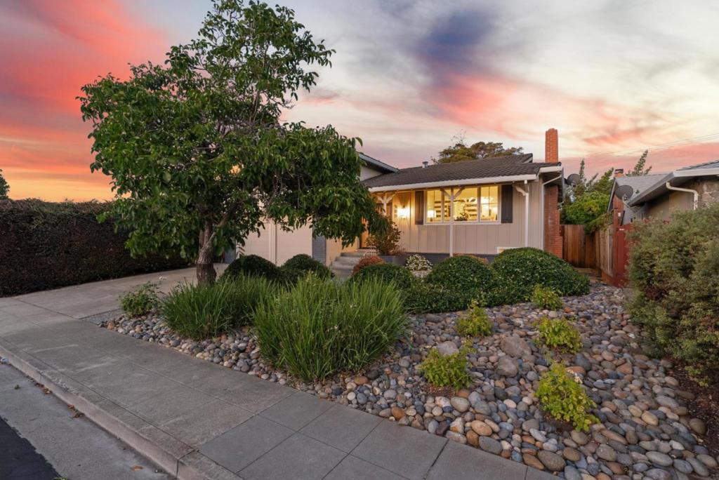 Welcome to 985 Capitola Way a completely renovated, multi-level home featuring five spacious bedrooms, 3.5 bathrooms, and a sparkling backyard pool. The stylishly remodeled kitchen boasts quartzite countertops, custom cabinets, a decorative tile backsplash, and modern appliances and fixtures. The well-designed floor plan includes three bedrooms upstairs, while the additional two spacious bedrooms downstairs are perfect for home offices, offering a sense of separation from the rest of the house. These rooms could also serve as guest bedrooms, a home gym, or provide ample space for a large family. The larger downstairs room features an attached office area and built-in refrigerated wine closet. The professionally landscaped grounds include a childproof pool in the backyard secured with a deer fence and drought-tolerant landscaping in the front. The home is ideally located close to two large parks Carmichael Park and Curtis Field each just a block away, and only a mile from Central Park. Its also within walking distance of St. Lawrence. Situated just a mile from the new Apple campus, this home makes living, working, and playing effortless. Enjoy easy access to Lawrence and San Tomas Expressways, as well as Highways 101, 280, and 880.