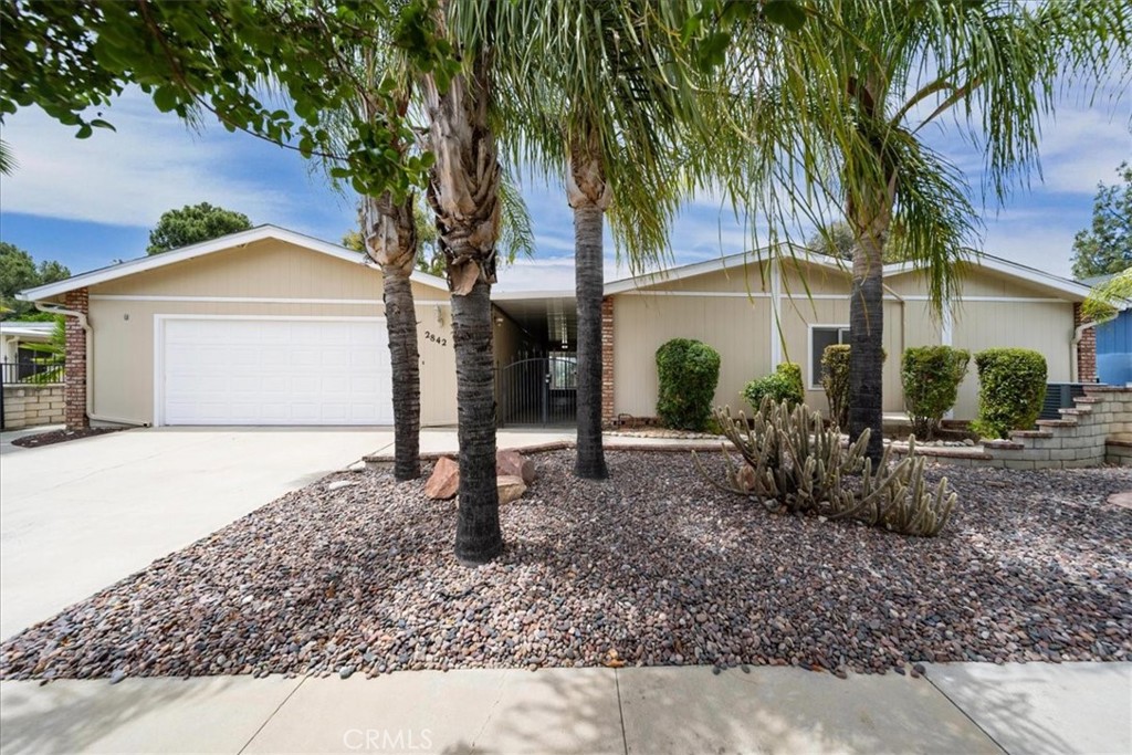 Absolutely Gorgeous!! This incredible and serene single-story home has breath-taking pond and gold course views and sits on one of the best lots in the community. It is nestled in the beautiful and highly coveted Seven Hills Community (55+) which provides relaxed style living and beautiful aesthetics. Situated on one of the most desirable lots, it showcases spectacular views, spaciousness, tranquility, and privacy. You will absolutely love the uniqueness this lot and location have to offer. The home has an amazing front yard, low maintenance landscaping, breathe taking backyard, and a LARGE 4 car garage, yes 4 car garage for storage and your vehicles! The home is equally amazing and meticulously cared for. Pride of ownership permeates this house as it boasts many upgrades and amenities such as bright and open floor plan, beautiful (and new) vinyl and carpet flooring, baseboards, tall ceilings, sky lights, ceiling fans, recessed lighting, huge kitchen with a lot of cabinets, quartz countertops and backsplash, stainless steel appliances, large walk-in pantry with shelves, gas fireplace, massive primary bedroom with 2 spacious walk-in closets, large bedrooms, the entertainer's delight backyard large enough for relaxing, entertaining friends and family, BBQing, an attached large sun room that can be an office or whatever you want, and so much more. The HOA (POA) is only $43 a year and you own the land! Did I mention the seller has an assumable loan at 3% interest rate and the home is on a permanent foundation? Words and pictures can never convey the beauty this home and neighborhood have to offer, come and see for yourself!!