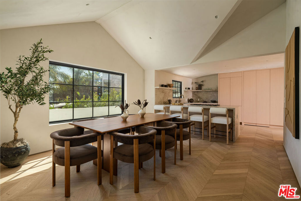 Tucked away on a quiet cul-de-sac above the legendary Sunset Strip and the iconic Chateau Marmont, this stunning residence isn't just a home, it's a statement. Here, every day feels cinematic: sweeping canyon breezes, dazzling city lights, and panoramic views that stretch for miles.Step into the newly reimagined main house, where soaring ceilings, chevron hardwood floors, and a hand-finished Portola lime-washed wall create a timeless, sophisticated vibe. The living space centers around a custom travertine fireplace, blending warmth and modern elegance, while the chef's kitchen delivers form and function with solid oak cabinetry, Thermador appliances, and Taj Mahal quartzite countertops.With 3 spacious bedrooms and 2 spa-like baths, plus a newly built ADU ideal for guests, a home office, or a creative studio, this property offers flexibility without compromise. And with rare driveway parking in the Hills, convenience is built in.Experience the quintessential Hollywood Hills lifestyle, a perfect mix of privacy, luxury, and effortless California living.