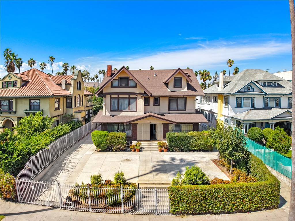 Income-generating triplex in prime Koreatown near USC & Downtown LA! Front home features 23 bedrooms plus two studio units in back, each with kitchen & bath. Property offers onsite laundry, 10 parking spaces (including 3-car garage), and low maintenance appeal. Perfect for developers, investors, or owner-occupants looking to live in one unit and rent out the rest. Perfect for investors or developers seeking an APT project in a high-demand location. Drive by only—do not disturb tenants. Showings by appointment.