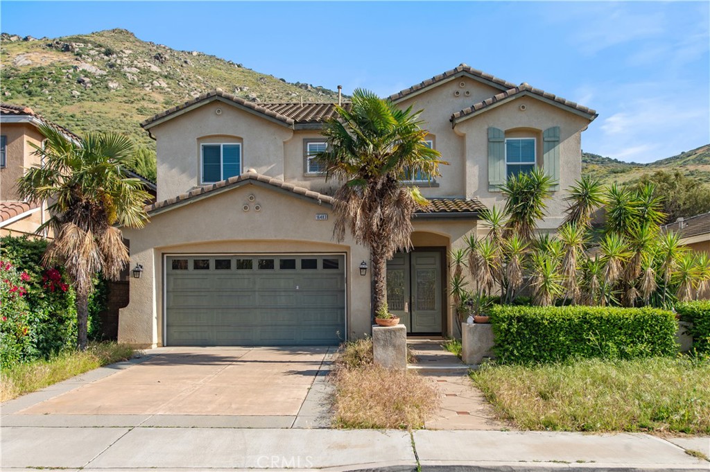 Welcome to 16483 Gala Ave – an exceptional lease opportunity in the highly sought-after Southridge neighborhood of Fontana. This beautifully upgraded former model home features 4 spacious bedrooms, 2.5 bathrooms, and over 2,800 sq ft of elegant living space. From the moment you enter, you'll be impressed by the soaring high ceilings, crown molding, plantation shutters, and travertine tile flooring throughout the main level. The expansive great room, complete with a cozy fireplace, flows seamlessly into the gourmet kitchen—an entertainer’s dream—featuring premium built-in KitchenAid stainless steel appliances, granite countertops, a large center island, walk-in pantry, and a built-in wine cooler. Upstairs, enjoy the versatility of a spacious loft, ideal for a home office or media room. Retreat to the luxurious primary suite offering a private balcony, spa-inspired bathroom with dual vanities and soaking tub, and an oversized walk-in closet. Additional highlights include luxury hardwood floor throughout the whole house, recessed lighting, built-in audio speakers, an upstairs laundry room with utility sink, and an attached 2-car garage. The low-maintenance backyard is perfect for entertaining, with a partially covered patio for year-round enjoyment. Conveniently located near top-rated schools, shopping, dining, and with easy access to the 10, 15, and 60 freeways—this home combines luxury, comfort, and convenience. Don't miss your chance to lease this stunning home—schedule a tour today!