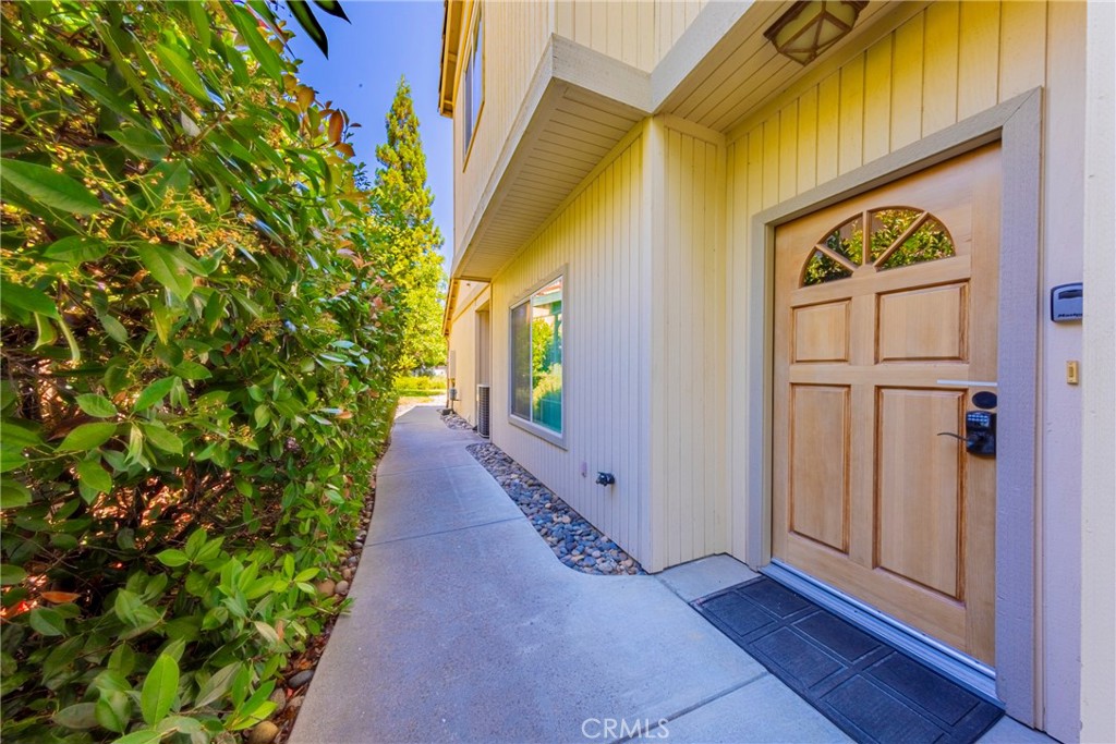 **. SHOWINGS Available 8/2 - 8/5/2025 **
Discover the peaceful beauty of North Shore Estates at Bass Lake, just 17 miles from the southern entrance to Yosemite National Park. Ideally situated for year-round recreation, this mountain retreat is also just minutes from Chukchansi Casino, scenic hiking trails, and endless outdoor adventure. Whether you're searching for a full-time residence, vacation escape, or investment property, this home delivers the perfect blend of resort-style living and natural Sierra serenity.
This warm and inviting 4-bedroom, 2.5-bath home offers approximately 1,800 sq. ft. of well-designed living space. The spacious great room opens to a private patio, perfect for relaxing and enjoying filtered lake views beneath towering pines. The kitchen features generous cabinetry, a pantry, and flows seamlessly into the dedicated dining room—ideal for entertaining guests or hosting family dinners. Upstairs, the primary suite includes a private balcony, a perfect spot for morning coffee or evening stargazing.
Additional highlights include a finished two-car garage with laundry area, abundant storage, and a flexible floor plan suitable for a variety of lifestyles—from a full-time family home to a vacation rental or weekend getaway.
Residents of North Shore Estates enjoy a host of amenities including a community pool, spa, clubhouse, boat parking recreation area that includes bocce ball, cornhole, table tennis, and there is seating where checkers & chess can be played + a walking paths that leads directly to Bass Lake's SHORELINE. Spend your days boating, paddle-boarding, swimming in the lake, then head up to Yosemite for hiking, sightseeing, and exploring one of California’s most iconic natural treasures.
This move-in ready home offers not just a place to live—but a chance to embrace the mountain lifestyle you've been dreaming of.
