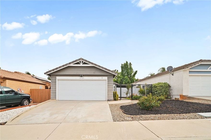 Welcome to 27780 Hillpointe Dr, a charming single-story home located in the heart of Menifee. This 2-bedroom, 2-bathroom residence offers 927 square feet of living space on a spacious 5,227 sq ft lot. From the moment you arrive, you're greeted by a gated front patio and a vibrant garden featuring fruit trees, including pomegranate, cherry, plum, and lemon guava, setting a welcoming tone.

Step inside to vaulted ceilings and an open living area filled with natural light. The kitchen flows seamlessly into the living room and features a gas range, tile countertops, and an updated sink,   perfect for casual entertaining or cozy nights in. The primary bedroom includes its own ensuite bathroom with a shower, while the secondary bedroom is adjacent to a full bath with a new toilet and a shower/tub combo. A convenient indoor washer and dryer setup adds to the home's functional layout.

Out back, enjoy your own private retreat with a pergola-covered patio, grassy area, peach tree, cozy brick firepit, and seating area ideal for relaxing evenings or weekend gatherings. Additional upgrades include brand-new windows and a new sliding glass door that opens to the backyard.

Just a short walk away, enjoy access to the community pool and park. Situated in the growing city of Menifee, this home offers a lifestyle that blends comfort, community, and convenience. With new shopping centers, schools, and easy freeway access nearby, Menifee continues to expand while still offering a relaxed suburban feel. Whether you're a first-time buyer or looking to downsize, this home is a wonderful opportunity to settle into a welcoming neighborhood with room to grow and enjoy.