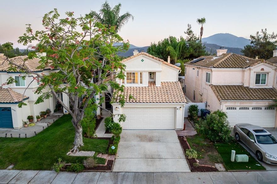 GORGEOUS REMODELED 4 bedroom Terra Bella home with storage and versatility galore! Enter to soaring ceilings, high end laminate flooring, a newly painted interior, new grey berber carpet, and thoughtful customization EVERYWHERE. Remodeled kitchen with quartz counters, light grey bead board paneled cabinets, tile backsplash, farmhouse sink, crystal knobs, stainless steel pulls, induction cooktop, pull out shelves, top to bottom fridge, built in banquette seating, recessed lights, pendants, crystal chandelier, and built in...  wine rack and shelves. A pass through at the kitchen to the adjoining room features a custom built in shelving unit with desk - enjoy the space as an office, study area, play room, or dining room. Living room with a fireplace and a mantle that opens for storage lies adjacent to the kitchen. 4 bedrooms upstairs, including a primary bedroom with pitched ceilings & walk in closet. Bathrooms include white beadboard cabinetry, black granite counters, tiled flooring and showers, wainscoting, and more. Large custom enclosed pantry in garage, along with epoxy flooring and shelving. Newly mulched yard with covered patio space, new white vinyl fence, jacuzzi, dog runs, and fun entertaining spaces. Walkable to retail, parks, zoned for Valhalla High School, and so much more...come see all this home has to offer!