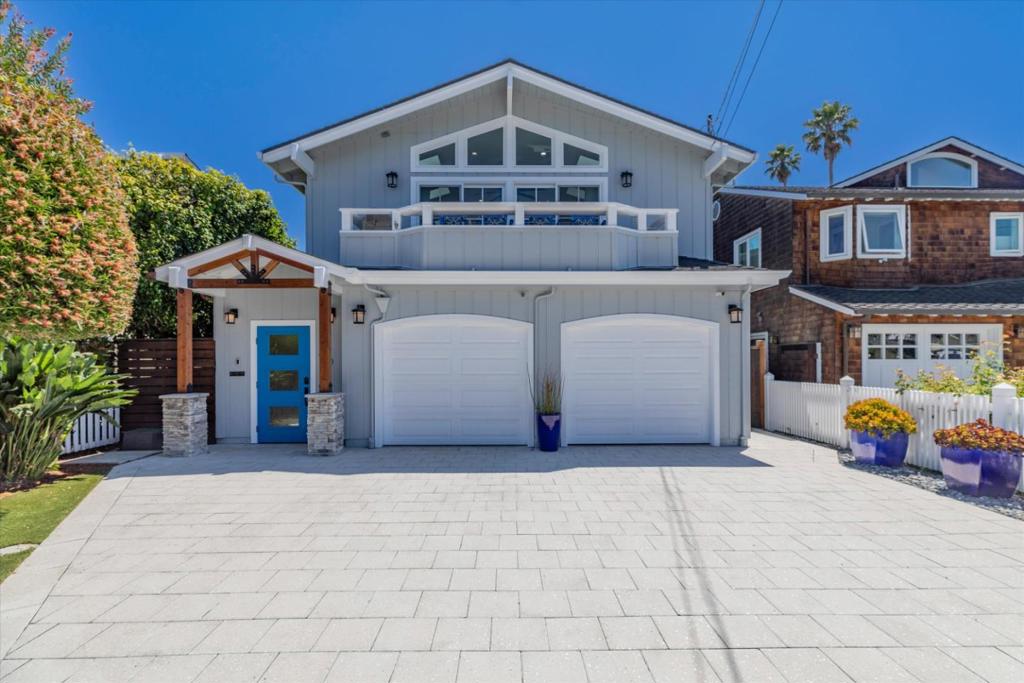 This one won't last! RARE in the BEST Capitola Jewel Box location. Super close to Capitola Beach & Village. Rebuilt to the studs in 2015, this 3 bed, 2 bath home has been completely upgraded w/every amenity. Reverse floorplan w/open-concept living/dining/kitchen, vaulted ceilings, double sliders to large balcony with ocean view peek. Chefs kitchen w/custom cabinetry, quartz counters, gourmet AGA dual-fuel double oven/6-burner gas range. Miele dishwasher, new GE frig, custom pantry area. Upstairs primary bed and full bath with tub/shower, designer tile, floor-to-ceiling storage. Downstairs has 2 large bedrms, full bath, radiant heated tile floors. One downstairs bedroom equipped with amazing new $6K murphy bed. Converts to office desk for multi-purpose space. Double-pane windows, new doors, wide-plank walnut floors, new paint throughout. Large attic storage space with interior pull-down staircase access. Just finished 2023 ext paint and all landscape with coastal pavers, artificial lawn, decorative fences, auto sprinklers. Private courtyard entrance w/outdoor shower, heater, copper lighting. Huge 16 Hydropool swim spa with redwood decking and auto lift cover for year-round use. Covered patio. 2-car garage w/tons of storage. Walkable to shops & restaurants. This home is dialed!